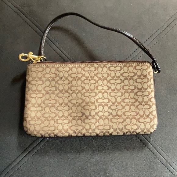 Brown Coach clutch purse with leather strap. - Picture 2 of 4